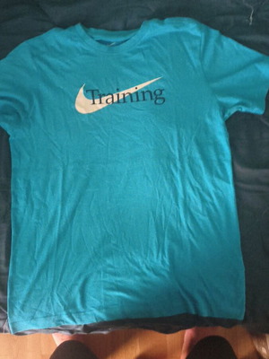 Nike T-shirt medium size like new, wide fit, white and blue