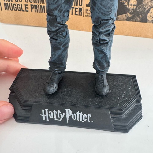 Harry Potter figure like new with base and wand