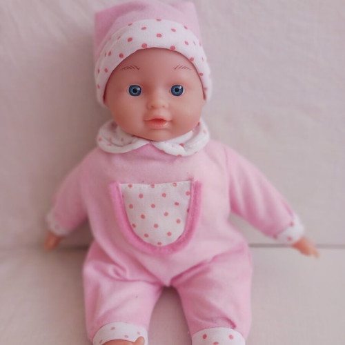 Baby doll with pink clothes like new