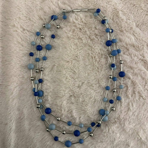 Silver necklace like new with blue beads in various shades