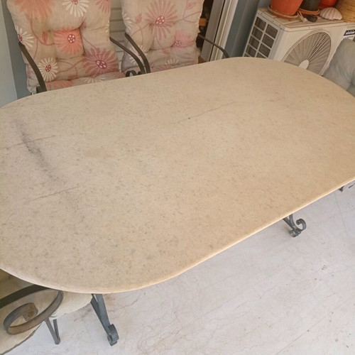 Marble garden table with four chairs used, heavy construction