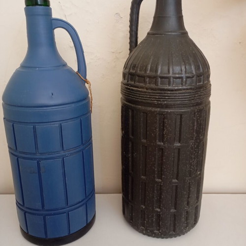 Glass bottles set of 2 used, one with moisture marks