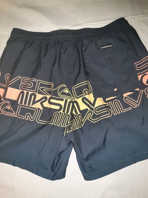 Quiksilver men's swim shorts new, size XL, black with orange-yellow print