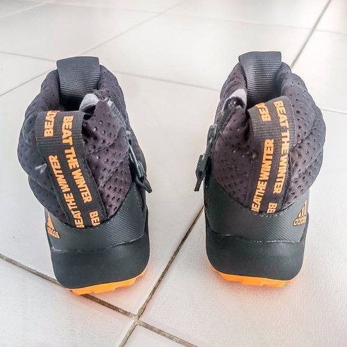 Adidas Rapidasnow kids winter boots like new, black orange size 24
