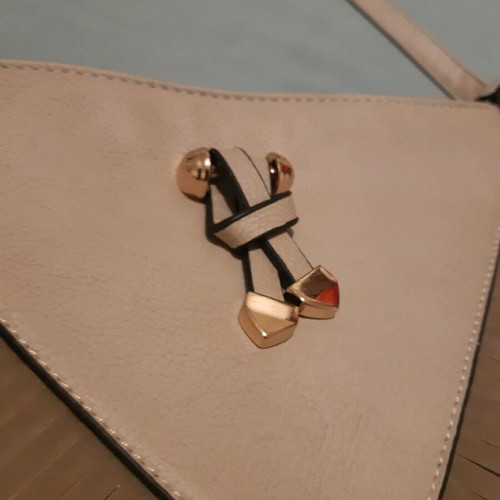 Beige crossbody envelope bag like new with gold details and fringes