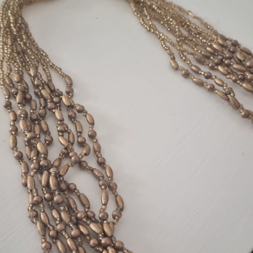 Necklace used, gold color