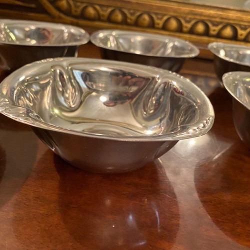 Set of 5 metal small plates and 6 matching stainless steel bowls used