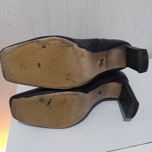 Black high-heeled boots with laces size 39 used