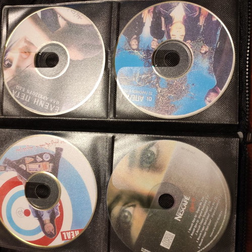 Set of 48 used music CDs with free case