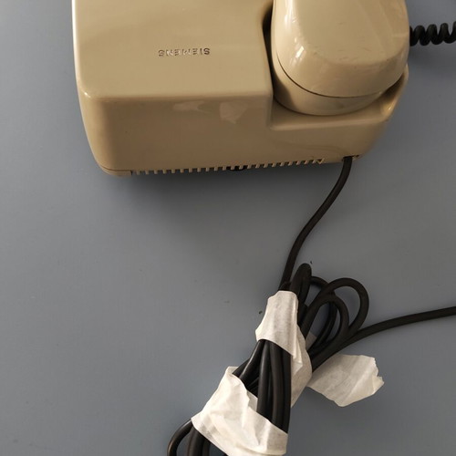 Siemens vintage telephone with rotary dial used
