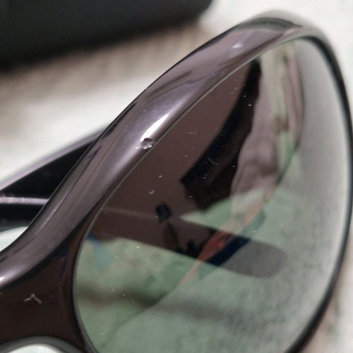 Dolce & Gabbana women's sunglasses used, oval black frame