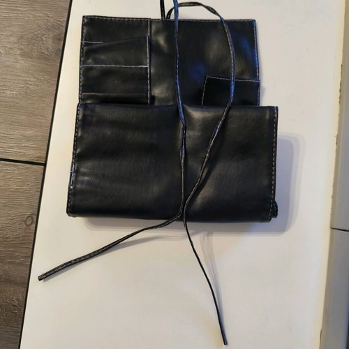 Makeup brush holder like new, black synthetic leather
