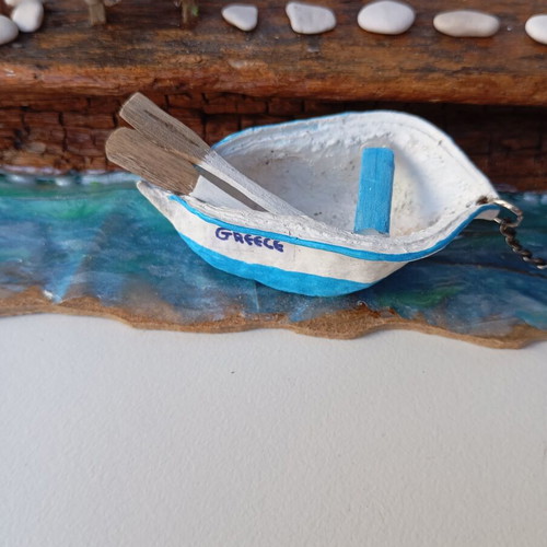 Handmade sea-themed driftwood diorama with Greek island house