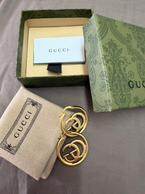 Gucci earrings hoops with GG logo gold color new with box and dust bag