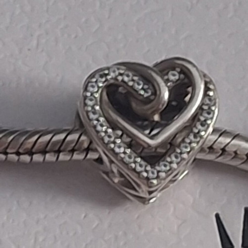 Pandora charm heart with linked hearts decorated with zircon stones, like new