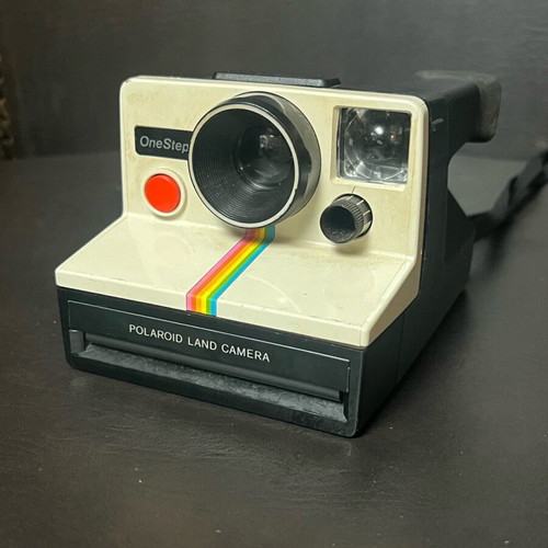 WCH Vintage Thrift Shop | Vintage Polaroid OneStep Land Camera, a famous rainbow stripe model originally released in 1977. It became an instant icon of the 80s for
