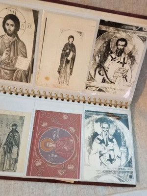 Album with photos of saints used