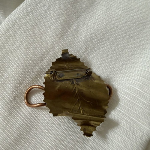 Handmade brooch with copper spiral and black stone, new