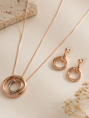 Jewelry set in rose gold with sparkling stones like new