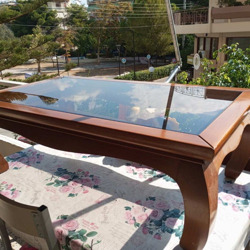 Solid wood coffee table with glass