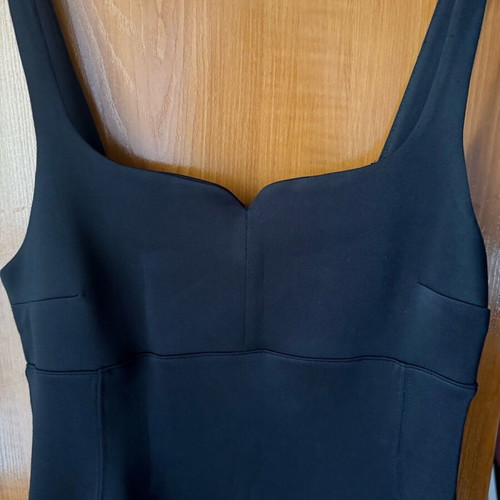 Pink Woman dress black like new, tight with nice chest cut