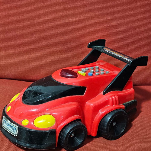 Toy car used with programmable functions, missing battery cover