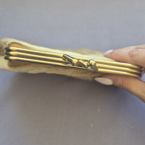Wallet like new with gold details and fur, beige