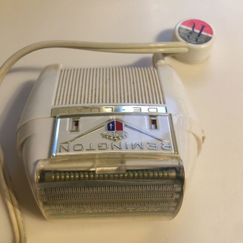 Vintage Remington shaver and massage device used