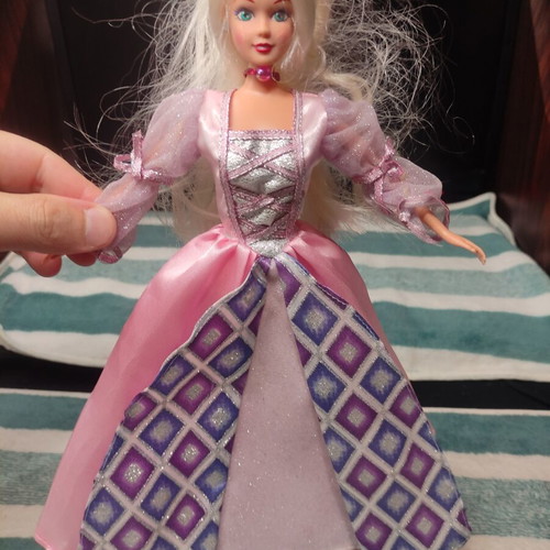 Doll with beautiful dress used