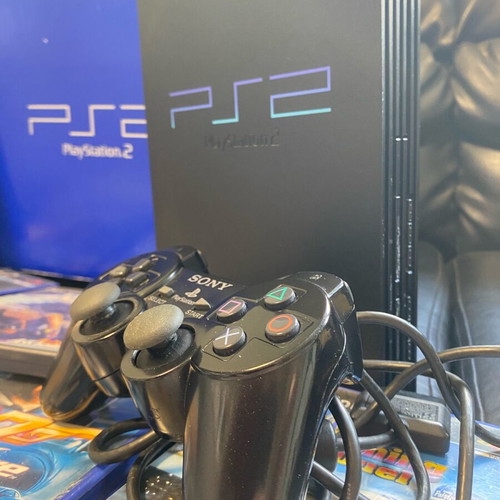 PlayStation 2 κονσόλα σαν καινούργιο με 7 παιχνίδια, χειριστήριο, καλώδια και memory card