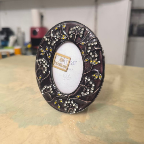 Round photo frame like new with colorful decorative patterns