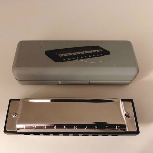 Metal harmonica 10 holes like new with case and cloth