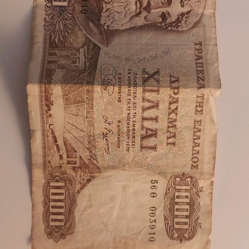 Greek and American paper money used