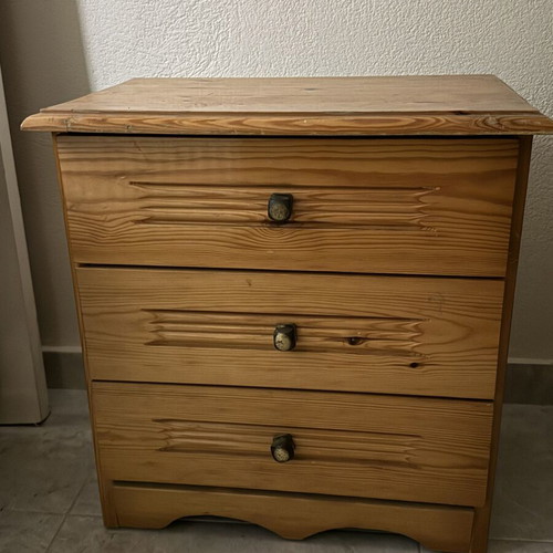 Wooden nightstand used with three drawers, classic design