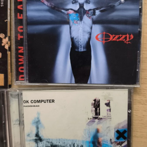 Ozzy Osbourne and Radiohead CD set like new, 5 CDs