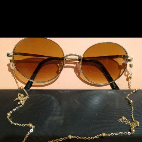 Miu Miu sunglasses used with case and cloth, black and gold