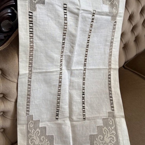 Handmade tablecloth used with openwork and lace, beige