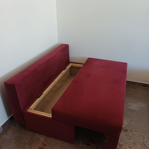 Corner sofa bed like new, burgundy with storage and cushions