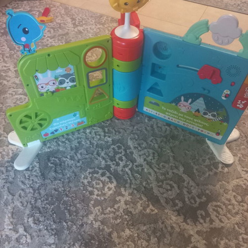 Educational toy with songs, alphabet, numbers, and shapes used