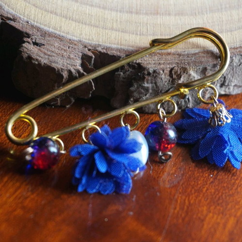 Handmade brooch with blue and gold hanging details new