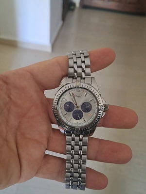 Regal wristwatch men's used, silver with blue decoration