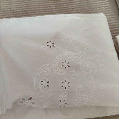 Set of embroidered cotton bed sheets, pillowcases and duvet covers