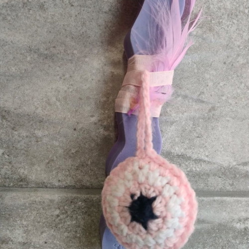 Handmade zig zag Easter candle with knitted eye and pink feather new
