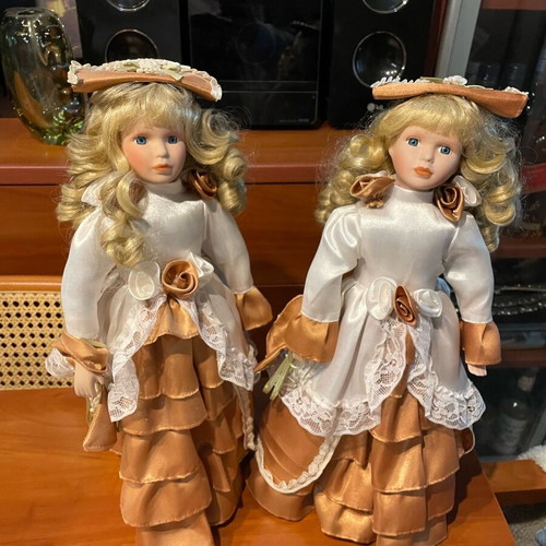 Vintage porcelain dolls like new