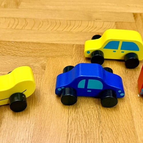 Wooden children's toy cars set of 4 Tiger like new