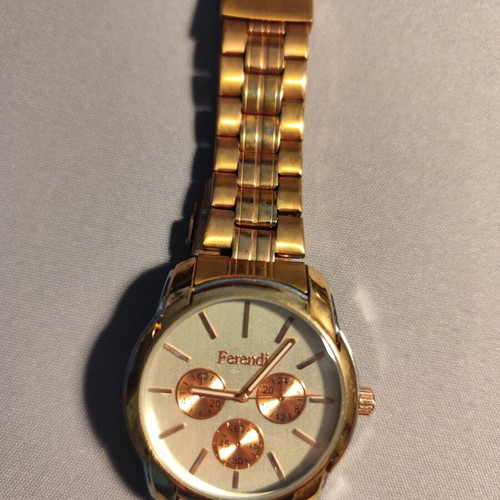 Ferendi F3998 women's watch like new, gold color