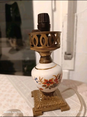 Antique table lamp used with metal elements
