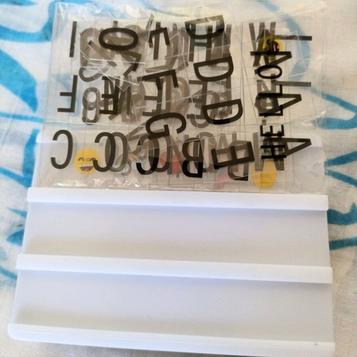 Table lamp with plastic letters used