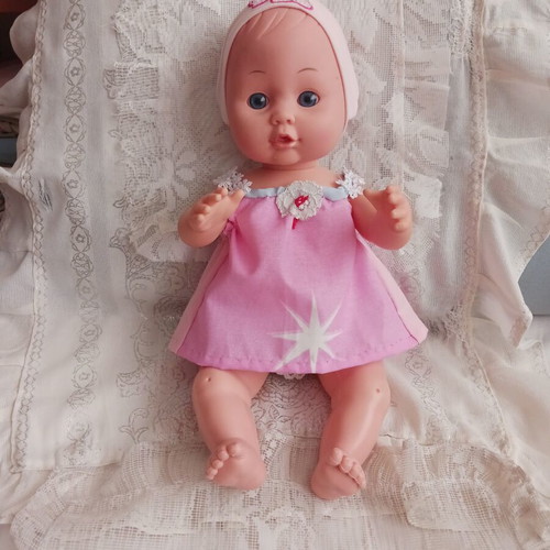 Baby Suzi doll like new with handmade clothes
