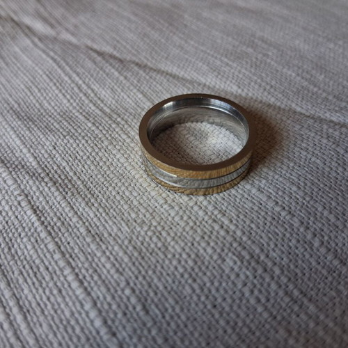 Steel ring silver and gold color like new